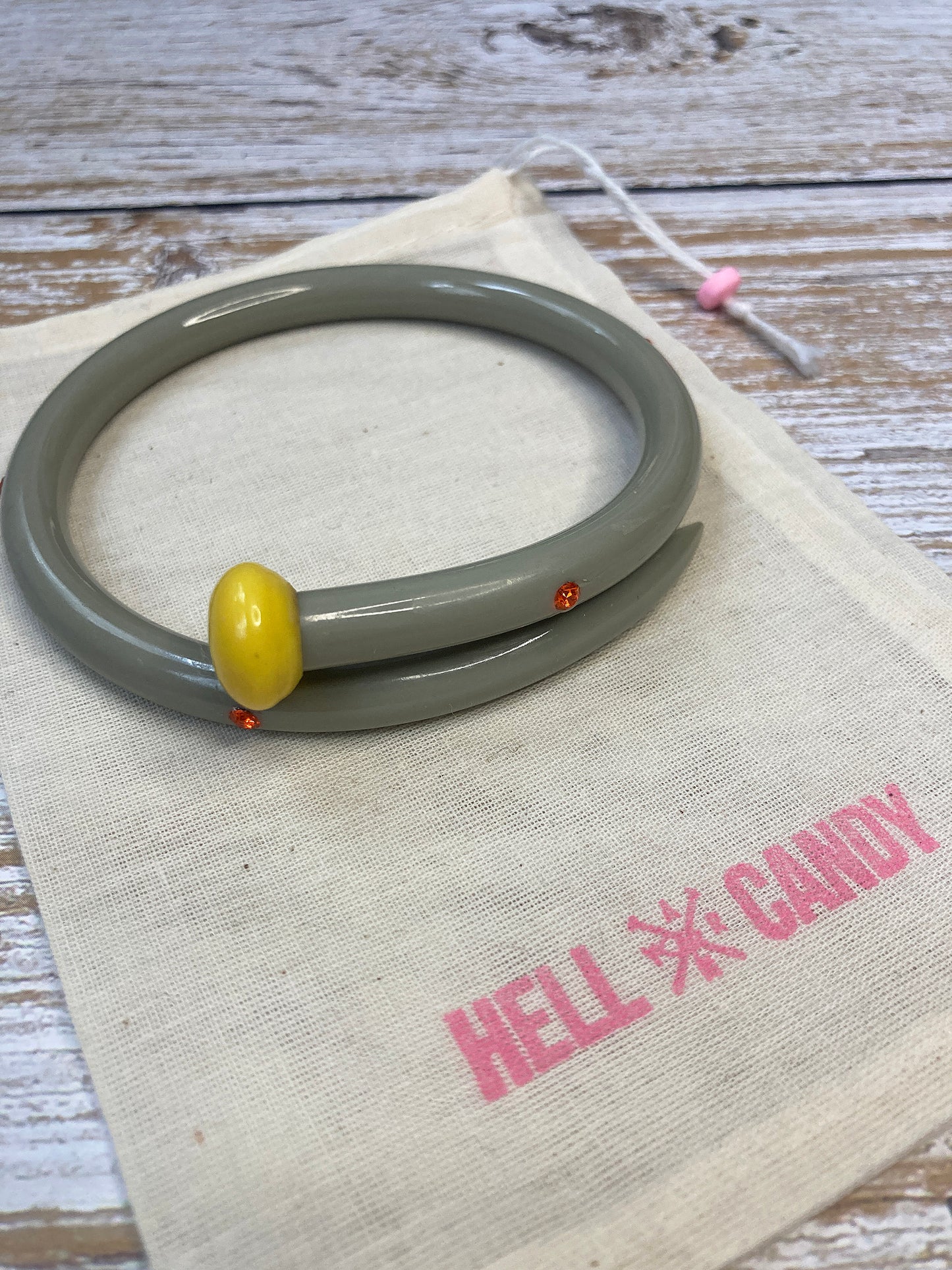 Hellcandy | Knitting Bangle - grey with orange diamante crystals